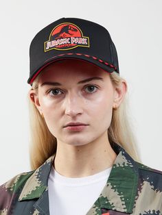 Adjustable snapback Mesh back panels Structured, pre-curved fit Flexible fit OSFM Imported Officially licensed Jurassic Park merchandise Jurassic Park Merchandise, Jurassic Park Logo, Black Trucker Hat, Logo Black, Jurassic Park, Apparel Accessories, Trucker Hat, Mesh, ? Logo