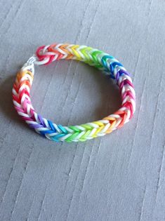 a multicolored bracelet sitting on top of a table