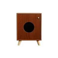 a wooden cabinet with a black hole in the front and legs on it's side