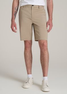 Tall Men's Shorts for the Everyday Where Function Meets Fashion Introducing our Tech Chino Shorts, a staple for the tall man's summer wardrobe. Designed with stretch fabric and a stretch waistband, these tall men's shorts offer unparalleled comfort and flexibility. The above-knee length and modern fit ensure a sleek, contemporary look, while the functional pockets add practicality. • Stretch fabric for ultimate comfort• Modern fit and above-knee length for a contemporary look• Functional pockets Cheap Big And Tall Men's Shorts, Men’s Khaki Shorts Outfit, Outdoor Khaki Pants With Built-in Shorts, Stretch Tapered-leg Chinos With Pockets, Tapered Leg 4-way Stretch Chinos With Welt Pockets, Scrubs Dress, Cozy Sleepwear, Sports Blazer, Long Sleeve Tee Shirts