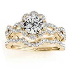 a yellow gold wedding ring set with a round diamond center surrounded by two rows of diamonds