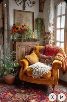 a living room filled with furniture and flowers