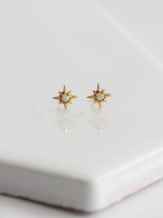 • Lab simulated opal adorned on gold plated stainless steel • non tarnishing and nickel free Tarnish Resistant Gold Opal Jewelry, Star-shaped Opal Jewelry Gift, Waterproof Jewelry, Star Studs, Ring Size Guide, Earrings Collection, Ring Bracelet, Everyday Essentials Products, Opal