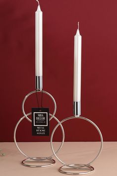 Add a Touch of Modern Elegance with These Silver Candle Holders Transform your home decor with this stunning set of two silver candle holders. Expertly crafted from premium stainless steel, these elegant candelabras feature a polished silver finish, making them perfect for any room. Whether you're decorating your living room, dining table, or console, these modern candle holders provide both function and style. Key Features: Material: High-quality stainless steel with a sleek silver coating Color: Stylish and luxurious silver finish Design: Modern and timeless, suitable for various interior styles Size: 28 cm in height, a perfect statement piece for your decor Versatile Use: Ideal for dining tables, mantels, consoles, or side tables Perfect Gift: A thoughtful gift for weddings, housewarmin Salt Candle Holder, Salt Candle, Silver Candle Holders, Metal Candelabra, Modern Candle, Modern Candle Holders, Silver Candle, Decorative Metal, Interior Styles