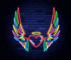 an angel heart with wings and halo on a brick wall in the shape of a heart