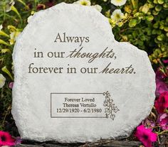 a memorial stone with the words always in our thoughts, forever in our hearts