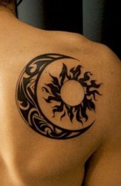 an image of a tattoo on the back of a man's shoulder and chest