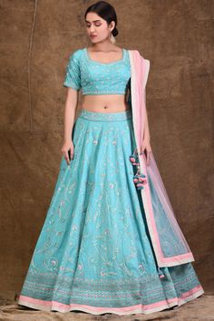 Blue kalidar lehenga with all-over floral motif work. Comes with embellished blouse and tassel border pink dupatta.
Components:3
Embroidered
Neckline:Leaf
Sleeve Length:Half
Fabric:Dupion, Net
Color:Blue
Kamar latkans
Tassel border dupatta
Tassel tie-up back
Closure: Lehenga: Side zip - Aza Fashions Embroidered Bridal Lehenga, Pink Dupatta, Embellished Blouse, Embroidered Neckline, Fashion App, Bridal Lehenga, Indian Design, Set For Women, Aza Fashion