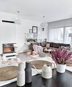 a living room filled with furniture and decor