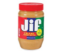 a jar of creamy peanut butter on a white background