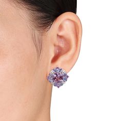 Each of these glamorous earrings for her features a cushion-cut amethyst encircled by pear-shaped tanzanites and round amethysts. The sterling silver earrings secure with omega backs. Tanzanite Studs, Tanzanite Earrings, Tanzanite Gemstone, Cluster Earrings, White Earrings, Amethyst Stone, Earrings Sterling Silver, Amethyst Gemstone, Buying Jewelry