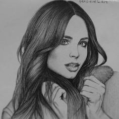 a pencil drawing of a woman with long hair