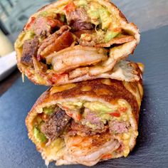 two burritos stacked on top of each other