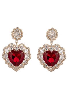 Get ready for the upcoming Valentine's Day holiday by garnering our Red Valentine Dangle Earrings! These dangle earrings boast ravishing red zirconia crystals that are encased within glimmering gold brass heart pendants for an extra special glow. Your Valentine's Day outfit is sure to be complete when you have these drop earrings on! Product Details: Material: Brass Stones: CZ crystals Measurements: approx. 1.5" length Closure: push-back Fairy Tale Jewelry, Heart Dangle Earrings, Red Jewelry, Valentine's Day Outfit, Cubic Zirconia Earrings, Earrings Red, Zirconia Earrings, Cute Earrings, Heart Design