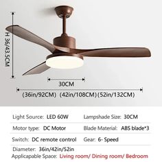 the ceiling fan is brown and has two lights on each side, one with a light bulb