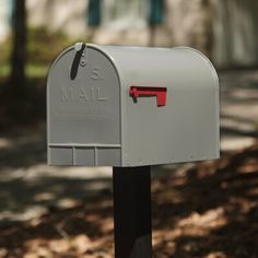 a mailbox is shown in front of a house