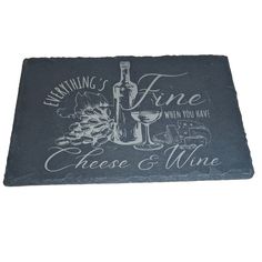 a slate cheese and wine sign with the words,'thinking fine when you have cheese and wine '