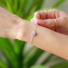 Add a touch of whimsy to your outfit with the Blossom Bracelet! Made with high-quality pink zircon and 925 Sterling Silver, this playful bracelet will add a touch of sparkle to any look. With a length of 6.3 inches and a 1.75-inch extension, it's versatile enough to fit sizes small through 3X. Silver Pink Sapphire Jewelry, Pink Bracelets With Sparkling Stones, Pink Cubic Zirconia Jewelry For Mother's Day, Dainty Pink Round Bracelet, Dainty Pink Jubilee Bracelet, Mother's Day Pink Cubic Zirconia Jewelry, Adjustable Sterling Silver Pink Jewelry, Adjustable Pink Sterling Silver Jewelry, Fine Jewelry Bracelets With Sparkling Stones For Gift