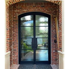 4 lite french iron double door with eyebrow arched top Double French Door, Arched Entry Doors, French Double Doors, Steel French Doors, Double Doors Exterior, Steel Front Door, Iron Entry Doors, Door Sweep, Arched Eyebrows