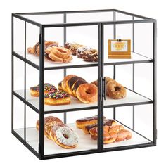 a display case filled with lots of different types of doughnuts and pastries