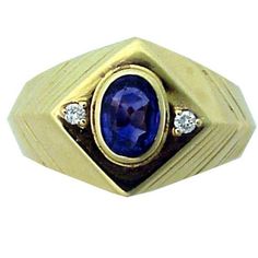 This estate lovely ring made in 14K yellow gold. This well crafted ring, showcases central oval 1.09 ct. sapphire accented by 2 diamonds (DTW is appro. 0.06ct.). Total weight is 7.85 gr. This gorgeous ring will attract admiration every time it is worn and is the perfect addition to any jewelry collection. Classic Yellow Gold Sapphire Ring Oval Cabochon, Timeless Oval Sapphire Ring Stamped 14k, Classic Oval Sapphire Signet Ring, Classic Sapphire Oval Signet Ring, Timeless 14k Stamped Oval Sapphire Ring, Oval Sapphire Signet Ring In 14k Gold, Yellow Gold Sapphire Ring With Diamond Oval Cabochon, Elegant Oval Sapphire Signet Ring, Yellow Gold Sapphire Diamond Ring With Oval Cabochon