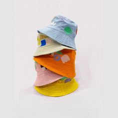 Studio Blinky x All Small Co Funny Shapes Bucket Hat | All Small Co – All Small Co. Fun Multicolor Bucket Hat For Spring, Colorful Bucket Hat For Spring, Cute Multicolor Wide Brim Hat, Trendy Multicolor Bucket Hat For Spring, Cute Multicolor Wide Brim Bucket Hat, Whimsical Wide Brim Bucket Hat For Summer, Playful Multicolor Bucket Hat For Summer, Trendy Bucket Hats For Spring, Playful Wide Brim Mini Hat For Summer