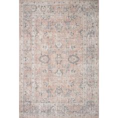 an area rug with faded colors and patterns on the bottom, in light pink tones