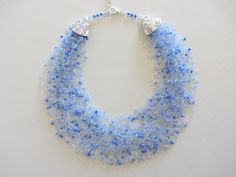 Azure Blue beaded necklace Chunky Necklace Crochet beads air necklace gift to my wife necklace boho choker necklace Measure the length of your neck with a measuring tape or you can use any thread, rope, or cable for telephone and after apply the measurements to a regular ruler. A beautiful airy necklace, hand crocheted from gray beads of light and dark shades. The necklace made of glass beads in sizes 10/0. You can choose the length of the necklace and the color of the closure when ordering. The Luxury Blue Beaded Necklace As Gift, Luxury Blue Beaded Necklace Gift, Handmade Light Blue Multi-strand Jewelry, Light Blue Multi-strand Jewelry As Gift, Light Blue Multi-strand Jewelry For Gift, Light Blue Multi-strand Jewelry Gift, Handmade Blue Multi-strand Necklace, Handmade Light Blue Necklaces, Handmade Adjustable Light Blue Necklace