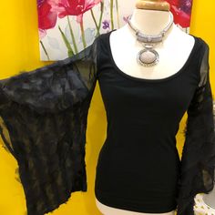 Beautiful Black Blouse Great Conditions Elegant Black Bell Sleeve Tops, Black Bohemian Top For Night Out, Bohemian Black Tops For Night Out, Chic Black Blouse With Bell Sleeves, Black Bell Sleeve Tops For Spring, Black Bohemian Blouse For Party, Bell Sleeve Tops For Spring Evenings, Bell Sleeve Tops For Spring Evening, Bell Sleeve Tops For Evening In Spring