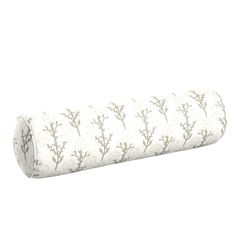 a roll of toilet paper with white and grey flowers on the front, sitting on a white background