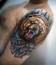 a man with a bear tattoo on his arm