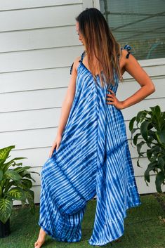 "Step into the world of boho chic with our stunning handmade jumpsuit. Crafted from soft and breathable 100% rayon fabric, this jumpsuit is designed for comfort and style. The adjustable tie shoulders allow for a customizable fit, while the wide legs create a flowy and relaxed silhouette. Measuring 45 inches when tied at the shortest and 50 inches at longest length, this jumpsuit is perfect for any occasion. Whether you're heading to a summer festival or simply lounging around, this jumpsuit is Harem Dress, Jumpsuits Summer, Indigo Pattern, Tie Dye Hippie, Boho Jumpsuit, Womens Jumpsuits, Hippie Dress, Indigo Shibori, Dress Beach