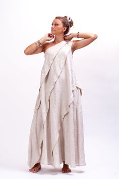 Wow them all in the Soft beige linen kaftan. Be in the spotlight with our One Shoulder Dress. This linen clothing has an one shoulder asymmetrical neckline, asymmetrically cut pieces and is oh so soft to the touch. This bohemian dress is sleeveless and fits neatly across the shoulder it has gentle, a-line shape that floats subtly away from the body. This Party Dress is your ticket to red carpet treatment. Soft beige linen kaftan dress who love to look good and fresh. The One Shoulder Dress is ma Linen Kaftan Dress, Linen Kaftan, Dress Bohemian, Linen Clothing, Bohemian Maxi Dress, Dress Linen, Soft Beige, Asymmetrical Neckline, Linen Maxi Dress