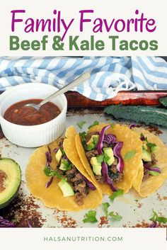 three tacos with beef and avocado on top