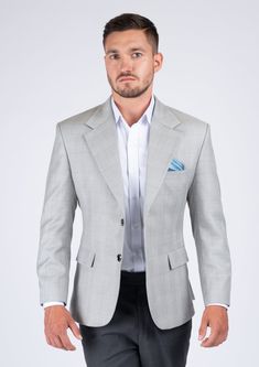 This Off-White Prince Of Wales blazer is made from superior quality wool fabric. The subtle yet standout prince of wales pattern is custom tailored to fit your unique style. Look stylish and confident in this exceptional light grey fabric, made just for you. Classic Gray Suit With Lapel Collar, Gray Notch Lapel Sport Coat For Formal Occasions, Gray Business Tweed Jacket With Welt Pockets, Gray Tweed Jacket With Welt Pockets For Business, Classic Tailored Gray Tweed Jacket, Classic Gray Tweed Jacket For Business, Classic Gray Blazer For Business Casual, Gray Business Casual Blazer In Suiting Fabric, Elegant Gray Tweed Jacket For Semi-formal Occasions