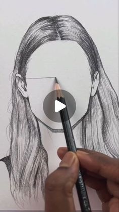 someone is drawing a woman's face with a pencil