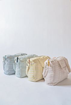 Meet the newest addition to the Pehr family, our Stripes Away Diaper Bag! With years in the making, our Diaper Bag was developed with you in mind, with the design you’ve come to know and love from Pehr and all of the pockets and compartments you always dreamed of having. Made with durable canvas that’s 100% cotton, lightweight and wipeable, our Diaper Bag is functional enough to take you through the day with baby and large enough to also double as an overnight bag.The timeless design and thought Blue Shoulder Bag With Side Pockets For Travel, Weekend Canvas Shoulder Bag With Pockets, Canvas Shoulder Bag With Pockets For Weekend, Blue Bags With Functional Pockets For Everyday Use, Everyday Satchel Duffle Bag With Pockets, Modern Diaper Bag With Zipper Pocket, Weekend Cotton Bags With Pockets, Cotton Shoulder Weekender Bag For Travel, Cotton Pouch Bag With Pockets