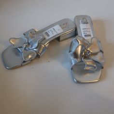 Nwob Circus By Sam Edelman Soft Silver Leather Slip-On Thong Sandals 6 * Retail: $80 Color: Solft Silver (Tag) Size: 6 Floral/Rhinestone Accent Material: Faux Leather Measurements (Sole): Length Heel-Toe: 9.2" Width: 3.2" Heel Height: 1.2" Nwob, New Without Box. (Bag- 2b)...Sond-4* Formal Open Toe Slippers For Summer, Formal Toe Post Synthetic Sandals, Formal Silver Mules For Summer, Formal Summer Slip-on Slippers, Formal Flat Summer Slippers, Silver Mules For Spring, Elegant Slip-on Flip Flops For Spring, Silver Flat Sandals For Spring, Casual Silver Heels For Beach