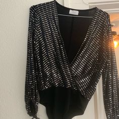 -Size Small -Sequin Bodysuit -Brand New -Perfect Condition -Never Worn Glamorous Long Sleeve Sequined Bodysuit, Elegant Long Sleeve Sequin Bodysuit, Metallic Long-sleeve Bodysuit For Party, Metallic Long Sleeve Bodysuit For Party, Sequin Bodysuit For Party Season, Party Season Sequin Bodysuit, Shiny Disco Bodysuit For Parties, Elegant Sequined Bodysuit For Night Out, Glamorous Metallic Bodysuit For Night Out