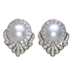 Earrings feature a very fine pair of 12.8 mm south sea cultured pearl button shaped pearls. They are further set with round diamonds weighing approximately 2.32 carats. Metal Type: 18 Karat White Gold Unique Pearl Earrings, Large Pearl Earrings, Wedding Bride Jewelry, 3 Carat Diamond, Pearl Necklace Designs, Diamonds And Pearls, Pearl And Diamond Earrings, Pearl Jewellery, Anniversary Jewelry