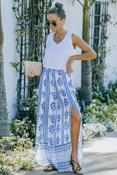 Blue Floral Print Wide Leg Pants with Slits Spring Vacation Bottoms With Split Hem, Summer Vacation Bottoms With Split Hem, Spring Maxi Bottoms With Side Slits, Spring Maxi Length Bottoms With Side Slits, Maxi Length Bottoms With Side Slits For Spring, Spring Bottoms With Split Hem For Day Out, Spring Pants With Side Slits And Split Design, Casual Bottoms With Split Hem For Day Out, Blue Maxi Length Summer Bottoms