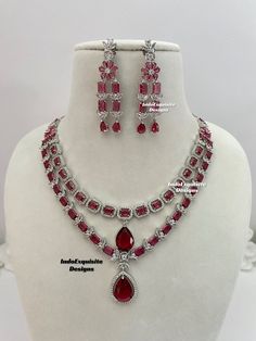 Double layer American Diamond Necklace Set / CZ Necklace/Indian Jewelry/ Reception Jewelry/ Bollywood Jewelry/ 2 two tier necklace/silver red All items are shipped from Brampton, Ontario, Canada. If you need your item by a certain day, please reach out to us for express delivery option before placing the order so that we can update the shipping for you. Standard shipping/delivery timeline Below are the delivery timeline estimates once the order is shipped. ---> USA delivery timeline * 3-6 busine Red Sterling Silver Jewelry Sets For Party, Red Sterling Silver Party Jewelry Sets, Red Double Strand Jewelry For Party, Double Strand Red Jewelry For Party, Red Double Strand Party Jewelry, Silver Layered Jewelry For Party, Layered Silver Necklaces For Parties, Layered Silver Jewelry For Parties, Red Double Strand Necklace For Party