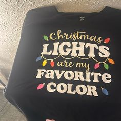 Black Christmas Lights Woman’s Size Xxl Red Believe Woman’s Size Xxl Black Nyc Woman’s Size Xxl Grey Universal Shirt Size L Universal Shirts, Black Christmas, Holiday Time, Christmas Lights, Favorite Color, Size 20, Everyday Wear, My Favorite, Black And Red