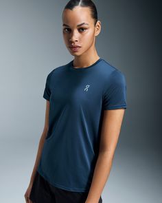 Go back to basics with this lightweight and versatile tee. Designed for the everyday runner's wardrobe. The single color makes it wearable enough to pair well with whatever you've got in your runner's wardrobe. It's understated so your personal best makes an even bigger statement. It's timeless, which means you can hold onto it for even longer. Made with recycled polyester, this lightweight fabric won't slow you down even an inch. Engineered for all seasons, this versatile T keeps you comfortabl Casual Moisture-wicking Activewear For Running Errands, Everyday Stretch Functional Tops, Everyday Functional Stretch Tops, Functional Stretch Tops For Everyday, Blue Athleisure T-shirt For Everyday, Functional Crew Neck Tops For Everyday, Functional Everyday Crew Neck Tops, Functional Everyday Go-dry Tops, Athleisure Go-dry T-shirt