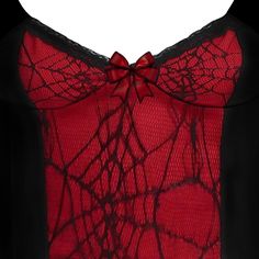 a woman's red top with black lace and a bow at the neckline