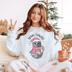 Be festive this holiday season in our trendy Snow Boujie pink disco sweatshirt. This cute snowman Christmas crewneck is slightly oversized, perfect for a girly xmas aesthetic. * Ultra soft * Distressed design * Pre-shrunk * Universal fit * True to size * DTG Printing * Brand - Gildan Refunds/Exchanges: * No Cancellations * No returns/exchanges * All sales are final Sizing: Our graphic tees and sweatshirts are a true to size standard unisex fit. For an oversized look, please size up. For a TShirt dress fit, we recommend sizing up at least two sizes. Please oversee the sizing chart provided in the listing photos to ensure your measurements are correct as we DO NOT offer cancellations, exchanges or returns. Shipping: All products are made to order and are usually ready to ship within 2-7 busi Casual Winter Party Sweatshirt, Winter Party Sweatshirt With Crew Neck, Winter Party Crew Neck Sweatshirt, Cute Sweatshirt For Holiday Winter, Cute Winter Holiday Sweatshirt, Pink Christmas Sweater, Xmas Aesthetic, Ugly Holiday Sweater, Chicken Shirts