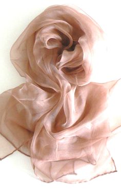 "Oblong 100% Chiffon Sheer Silk Scarf in solid color. Beautifully finished with hand-rolled edges. So soft, light and elegant it can be enjoyed all year round. Approx. 21\" x 57\" May be hand washed in cold water, hang dried and lightly ironed on low." Elegant Solid Color Silk Scarf For Summer, Elegant Solid Silk Scarf For Summer, Spring Drinks, Silk Chiffon Scarves, Sheer Scarf, Scarf Belt, Chiffon Scarf, Hand Roll, Sheer Chiffon