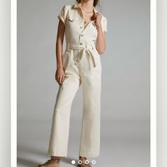 Never Worn, New With Tags This Utilitarian Chic Jumpsuit By Paige Makes It Effortless To Look Polished. Cut From A Comfort-Stretch Fabric With A Self-Tie Belt That Highlights Your Curves, This Cropped Wide Leg Silhouette Is Perfect For Pairing With Sneakers Or Slides, Depending On Your Mood. Chic Cream Jumpsuits And Rompers With Pockets, White Belted Jumpsuits And Rompers, Cream Fitted Jumpsuits And Rompers For Work, Fitted Cream Jumpsuit For Workwear, Fitted Cream Jumpsuits And Rompers For Workwear, Puff Sleeve Jumpsuit, Pegged Jeans, Chic Jumpsuit, Burgundy Pants