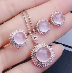 Welcome to Elegant Art Jewelry!  Stone: Natural Rose Quartz Stone Size: ( 8mm×8mm Earrings ), ( 8mmx8mm Ring ), ( 10mmx10mm Pendant ) Side Stone: Zircon Metal: 925 Sterling Silver Personalization: 9K/14K/24K/GOLD/SILVER/PLATINUM/ROSE-GOLD/WHITE GOLD. (Contact me)  Rose Quartz Pendant, Rose Quartz Cuff Pendant, 925 Sterling Silver Pendant, Oval Shape Pendant, Rose Quartz Pendant, Rose Quartz Engagement, Open Design Pendant, Rose Quartz Oval, Rose Quartz Natural, Pink Rose Quartz, Pink Rose Quartz Cheap Elegant Rose Quartz Jewelry, Exquisite Pink Jewelry With Halo Setting, Elegant Rose Quartz For Jewelry Making, Pink Gold Round Jewelry With Halo Setting, Pink Gold Jewelry With Halo Setting, Rose Gemstone Jewelry As A Gift, Rose Gemstone Jewelry For Gift, Round Rose Design Jewelry For Anniversary, Pink Round Cabochon Necklace