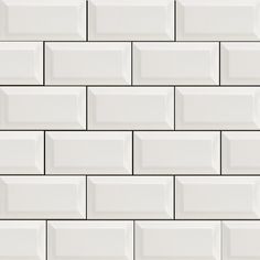 a white brick wall that looks like it is made out of tile